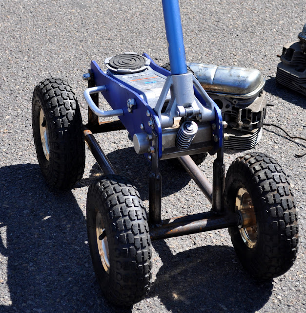 Just A Car Guy: A floor jack on knobby tires... for off road tire changes?