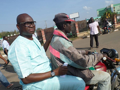 1a Photos of Ayo Fayose on a motorcycle in Ado Ekiti