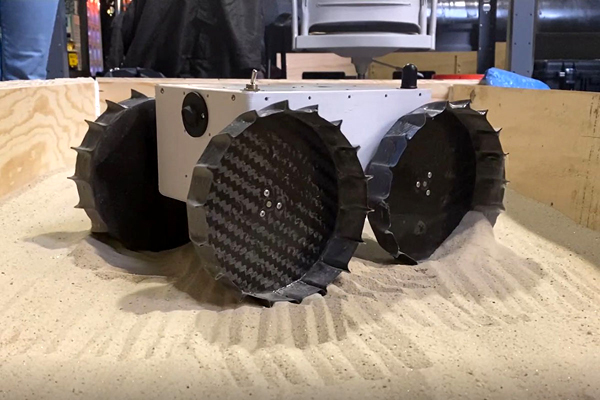 The Iris Rover undergoes testing inside a sandbox at Carnegie Mellon University in Pittsburgh, Pennsylvania. The Iris Rover undergoes testing inside a sandbox at Carnegie Mellon University in Pittsburgh, Pennsylvania.