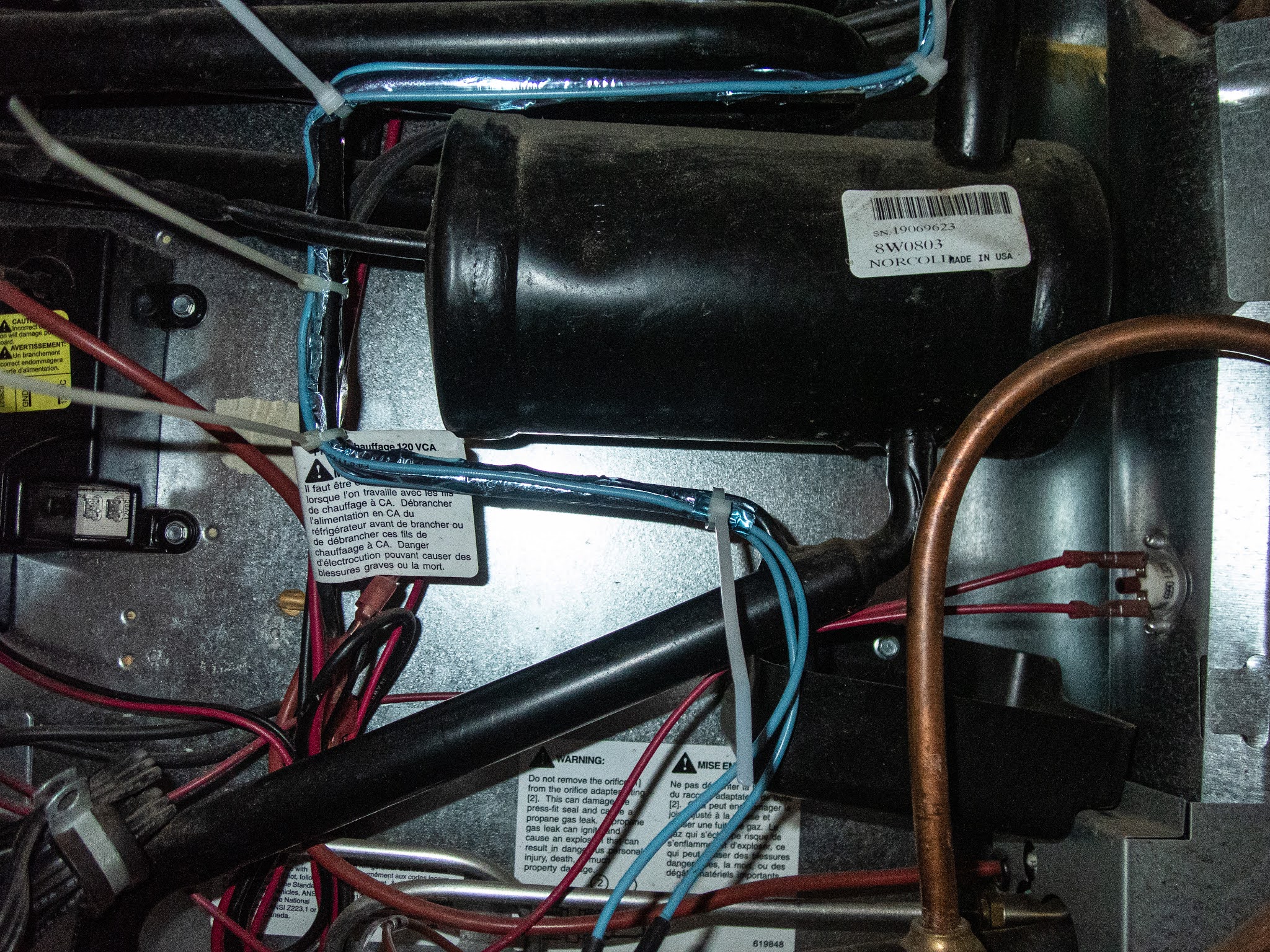 Binnshire, Backpacks, and Beer Installing a Cold Weather Kit on our Norcold Refrigerator