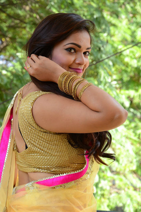 Ashwini Cleavage in Yellow Saree
