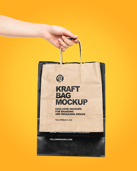 Download Hand W Two Paper Bags Mockup Yellowimages Mockups