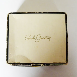Sarah coventry box with logo