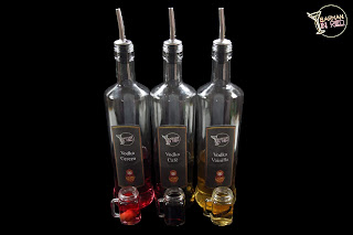 vodka sabor cereza café vainilla barman in red