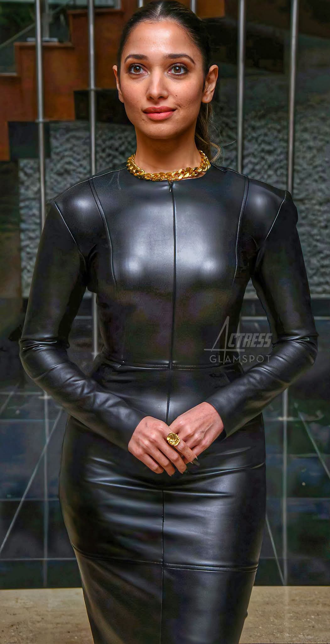 Milky Tamannaah Bhatia Hot Stills in Black Latex Dress E9PblWHWUAMHFW8