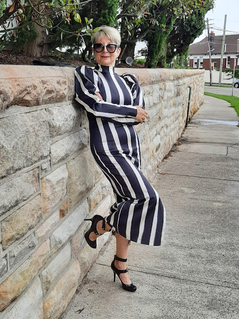 Black and white striped dress with puff sleeves