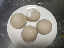 Round shaped dough balls for aloo paratha recipe