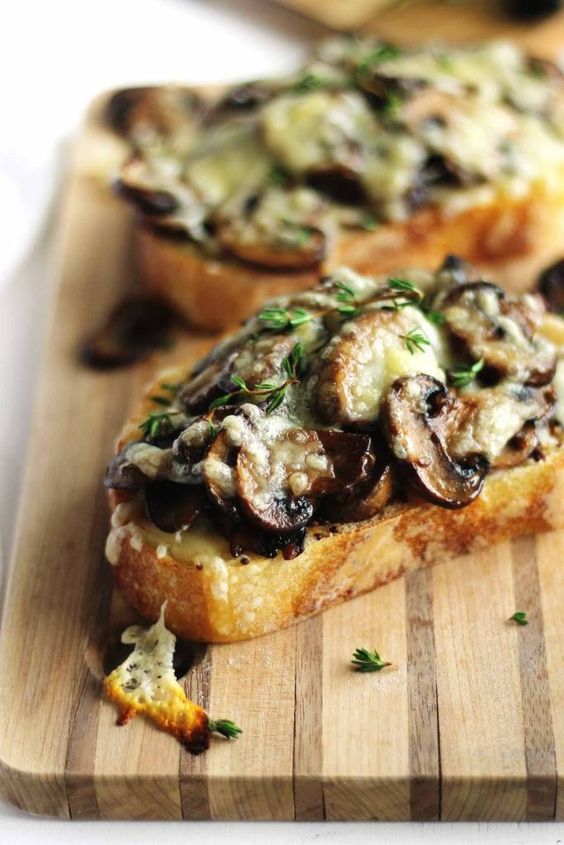 Cheesy Mustard and Mushroom Toasts - Quick and easy, these Cheesy Mustard and Mushroom Toasts are made with sautéed mushrooms with Maille Old Style Mustard, fresh time and melted swiss cheese. Hearty, savory and vegetarian. #ad