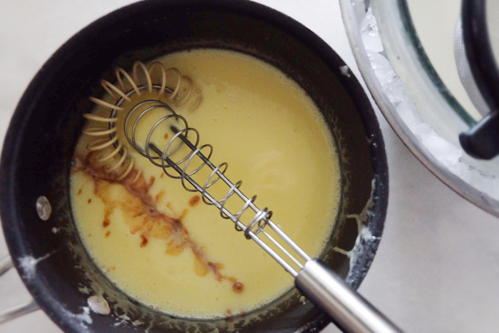 adding vanilla to cooked custard base