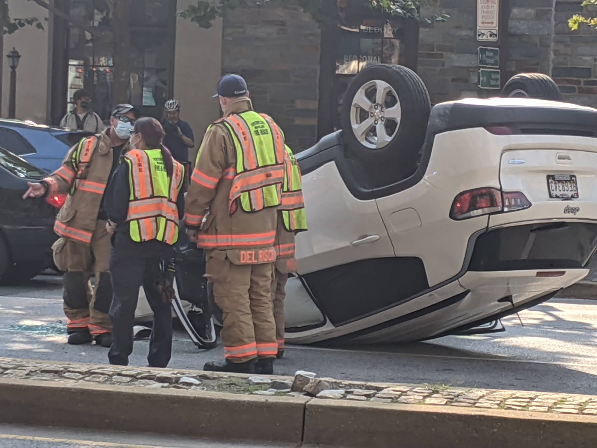 Robert Dyer Bethesda Row SUV flips over after collision with truck