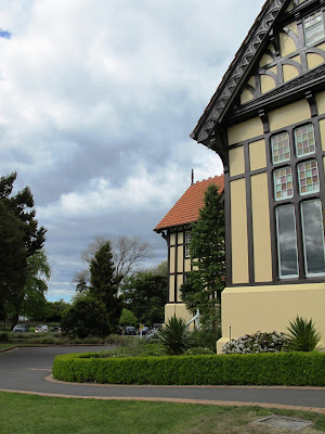 Corner of a large elizabethan-style building.