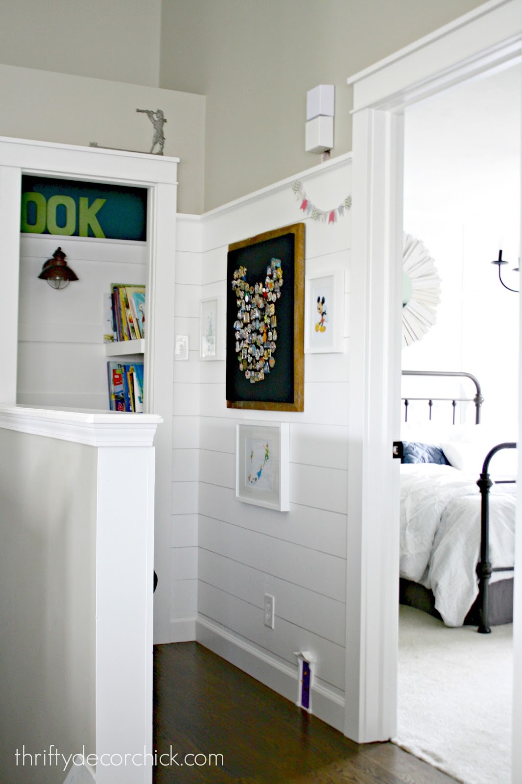 Our fun Disney art wall from Thrifty Decor Chick