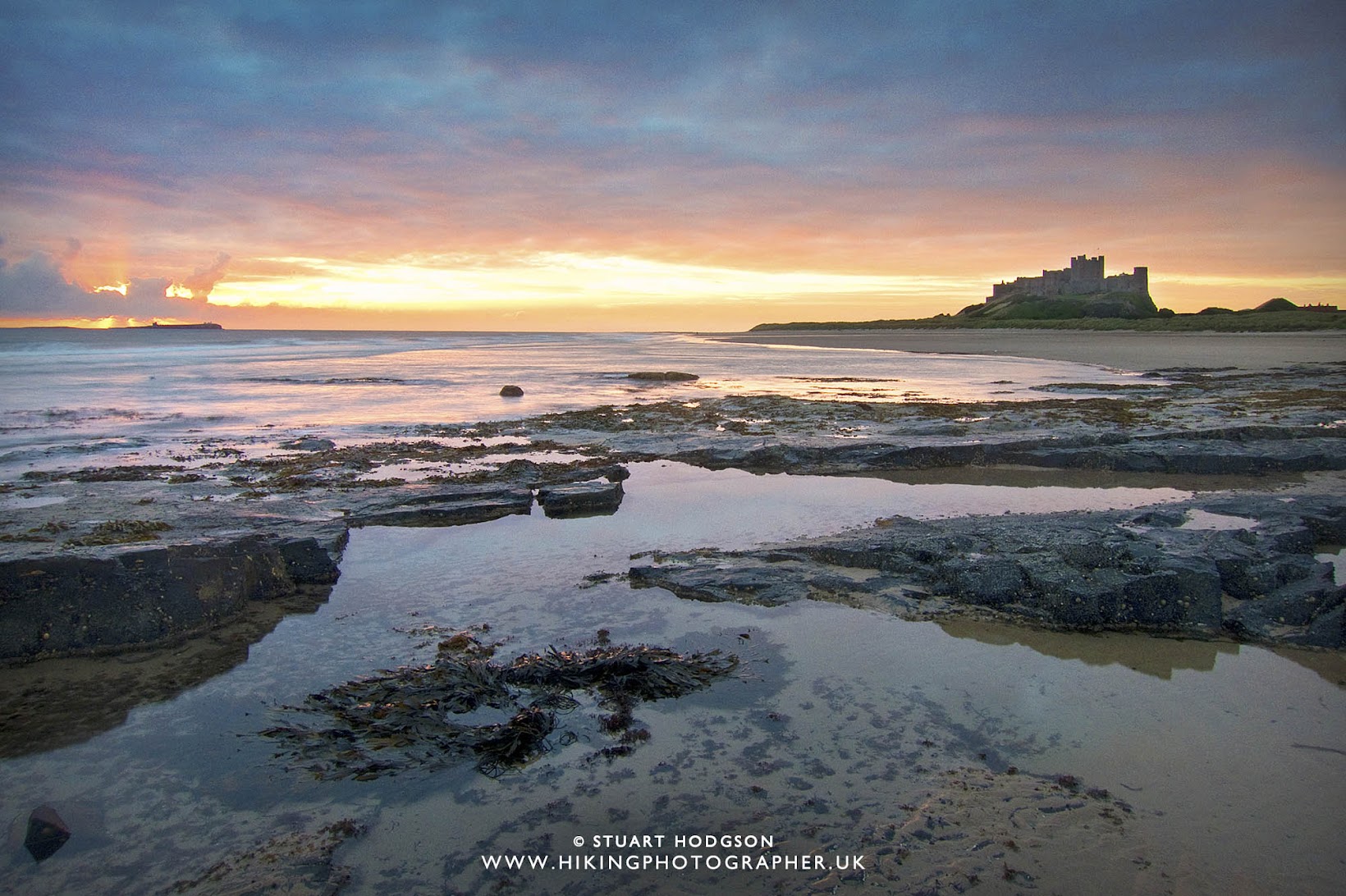 Bamburgh castle walk best view Northumberland sunrise