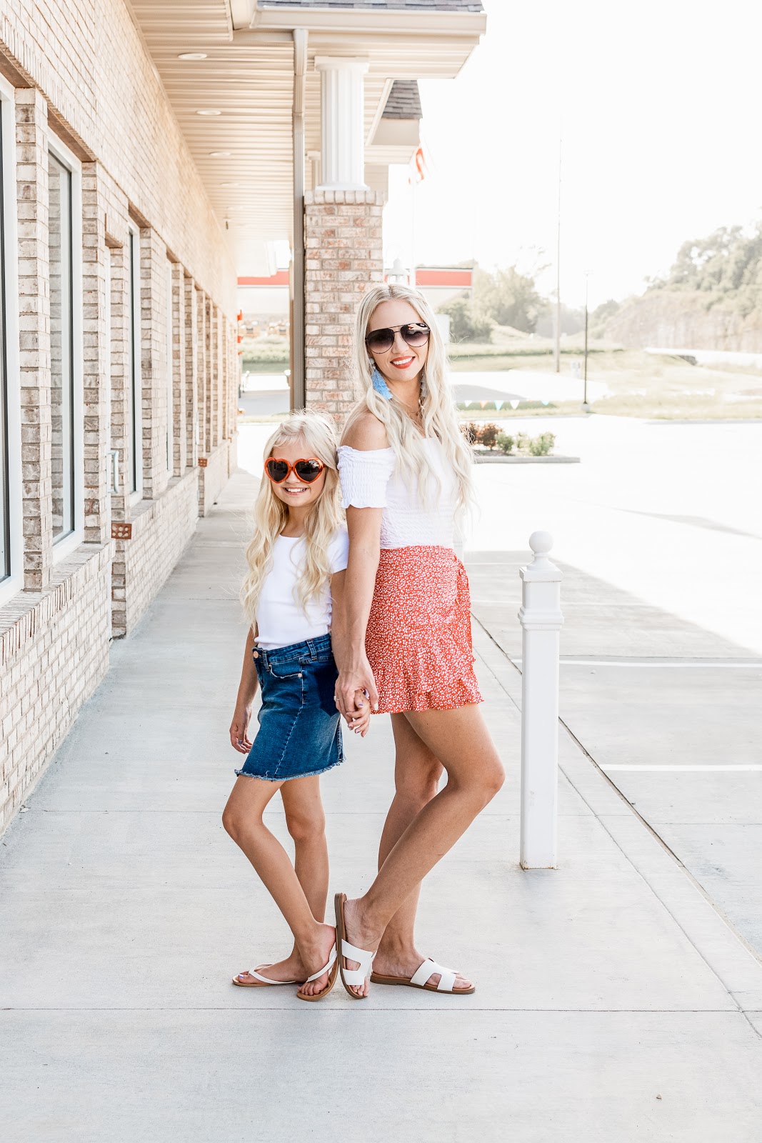Cute casual looks for the 4th of July for both mom and daughter! Outside BBQ Mom Life Mini Me Mommy and Me Twinning Matching 4th of July Independence Day Shorts Skirt Denim Cut off Skirt Red White Blue Americana American Flag Photography Lifestyle