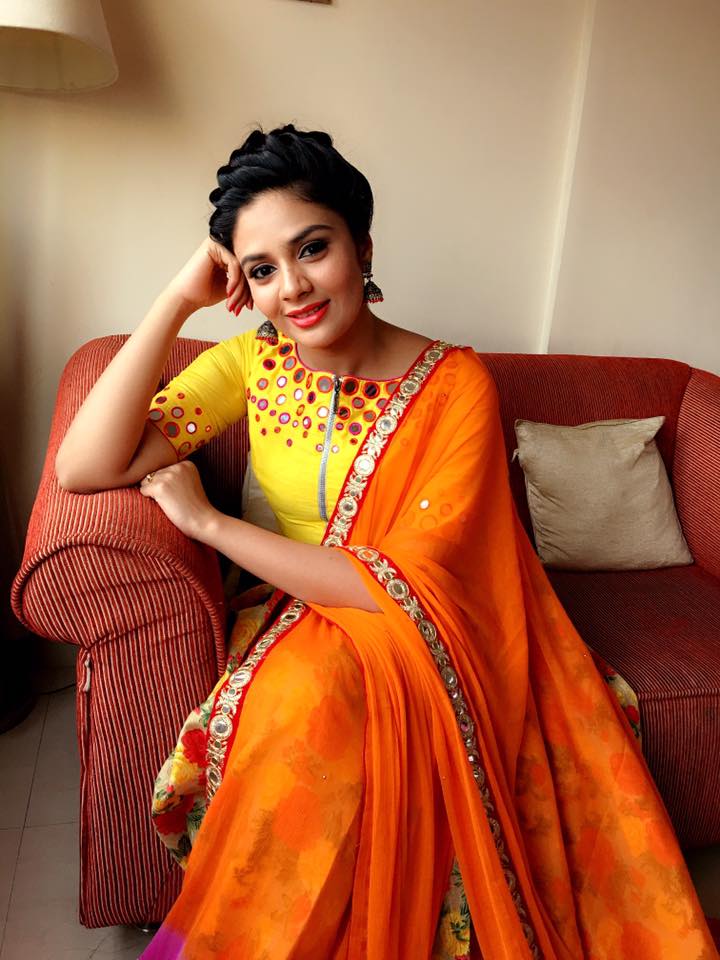 Telugu Tv anchor Sreemukhi In Orange Lehenga Choli