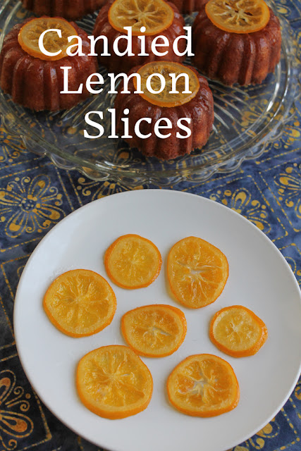 Food Lust People Love: Candied lemon slices are beautiful perched atop a cake but we have been known to eat them as is. They are a lovely combination of tart and sweet and they are wonderfully sticky.