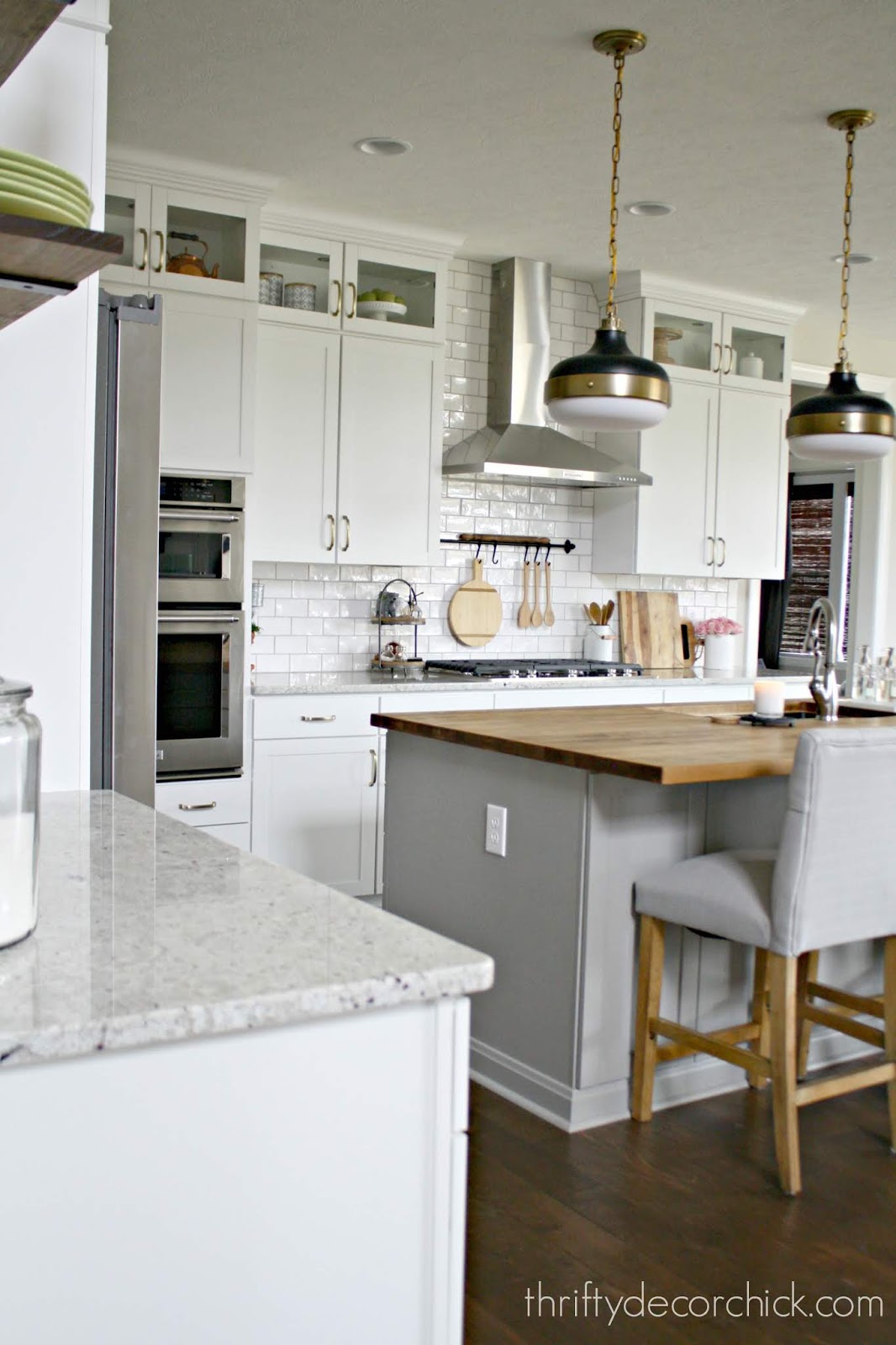 White kitchen cabinets gray island 