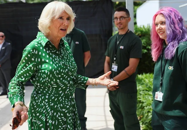 The Duchess wore a new ivy green floral print audrey drapery dota dress from Samantha Sung