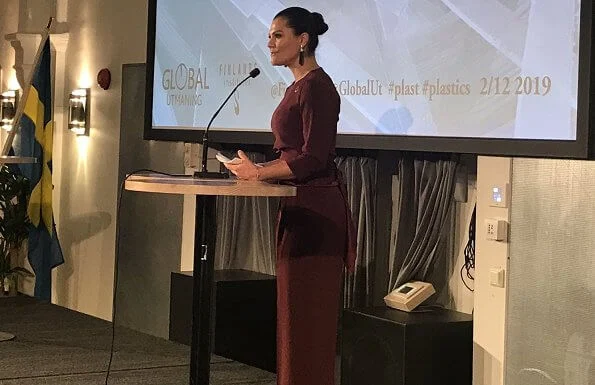 Crown Princess Victoria wore Andiata Kamille trousers and kiana blouse in burgundy, and Odnala wool coat in pink