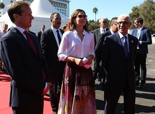 Crown Princess Mary wore a new floral print skirt and, white blouse and Gianvito Rossi pumps