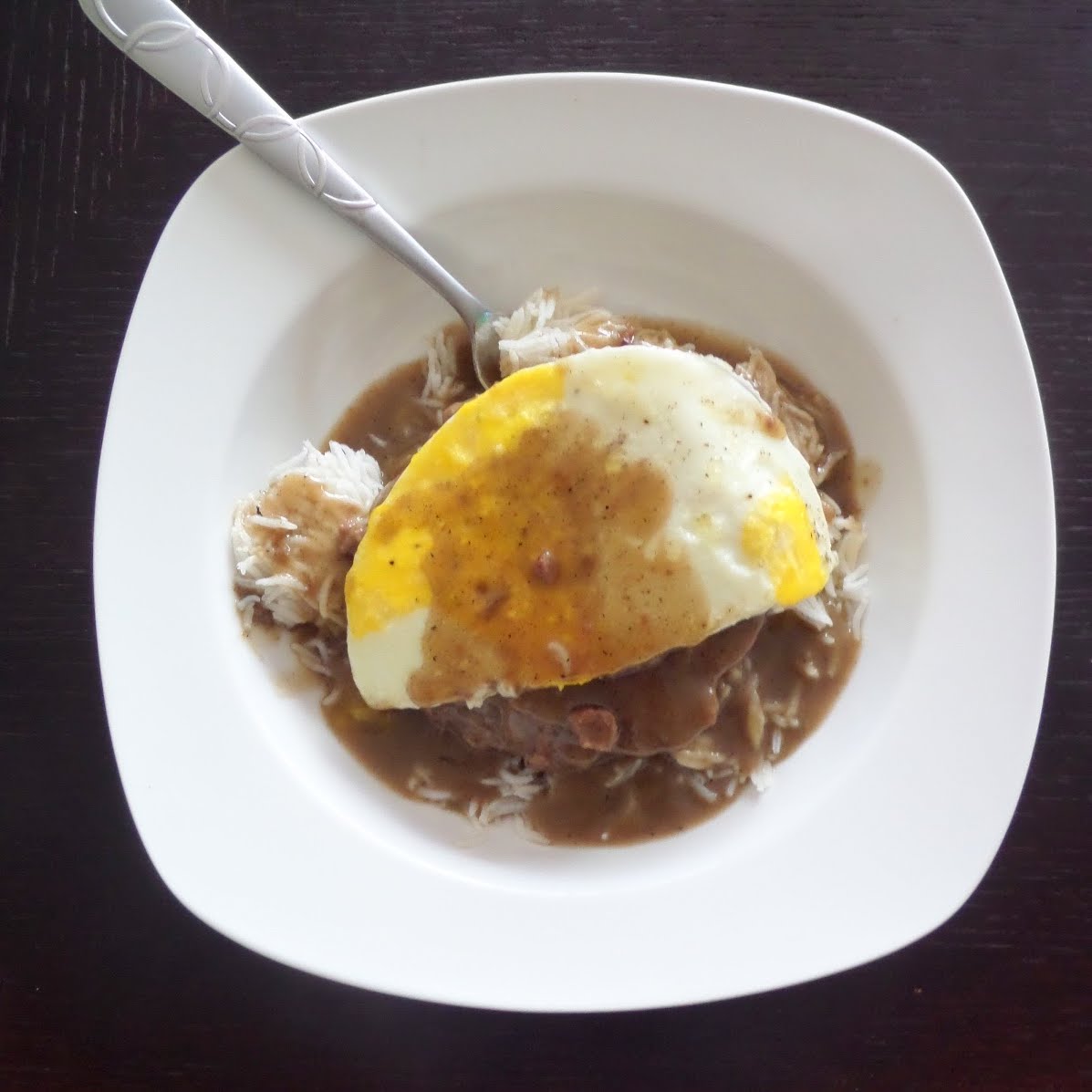 Loco Moco:  White rice smothered in brown gravy and a beef patty topped with a fried egg.  The Hawaiian breakfast of champions.