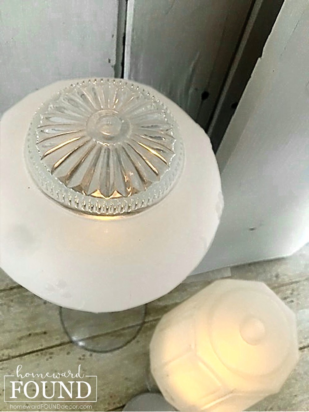 repurpose glass light globes as candleholders homeward found decor
