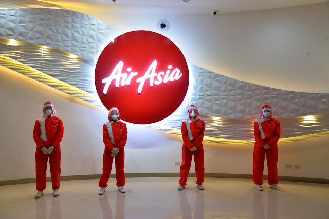 Air Asia Memperkenalkan Pakaian Seragam Seakan PPE Tersendiri