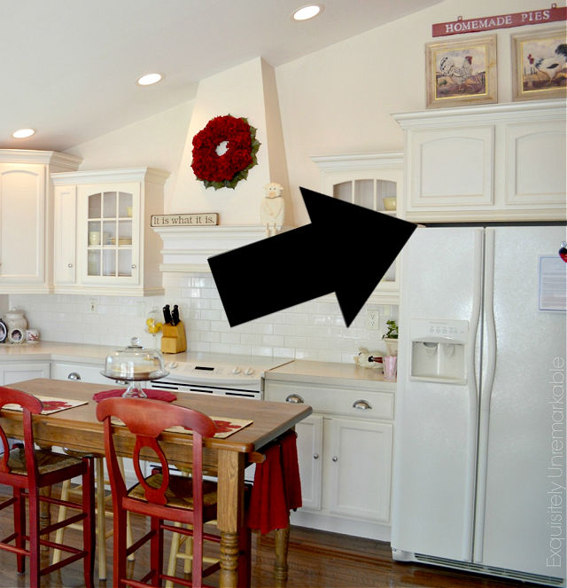 Bisque Kitchen with arrow pointing to regrets with space over fridge