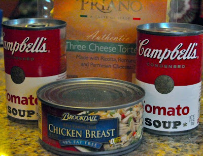 Creamy tomato tortellini soup ingredients lined up