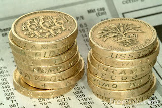 pile of £1 coins, money, voucher codes, 