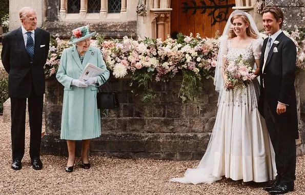 Princess Beatrice wore one of the Queen's vintage Norman Hartnell gowns and the Queen Mary diamond fringe tiara, wedding ceremony