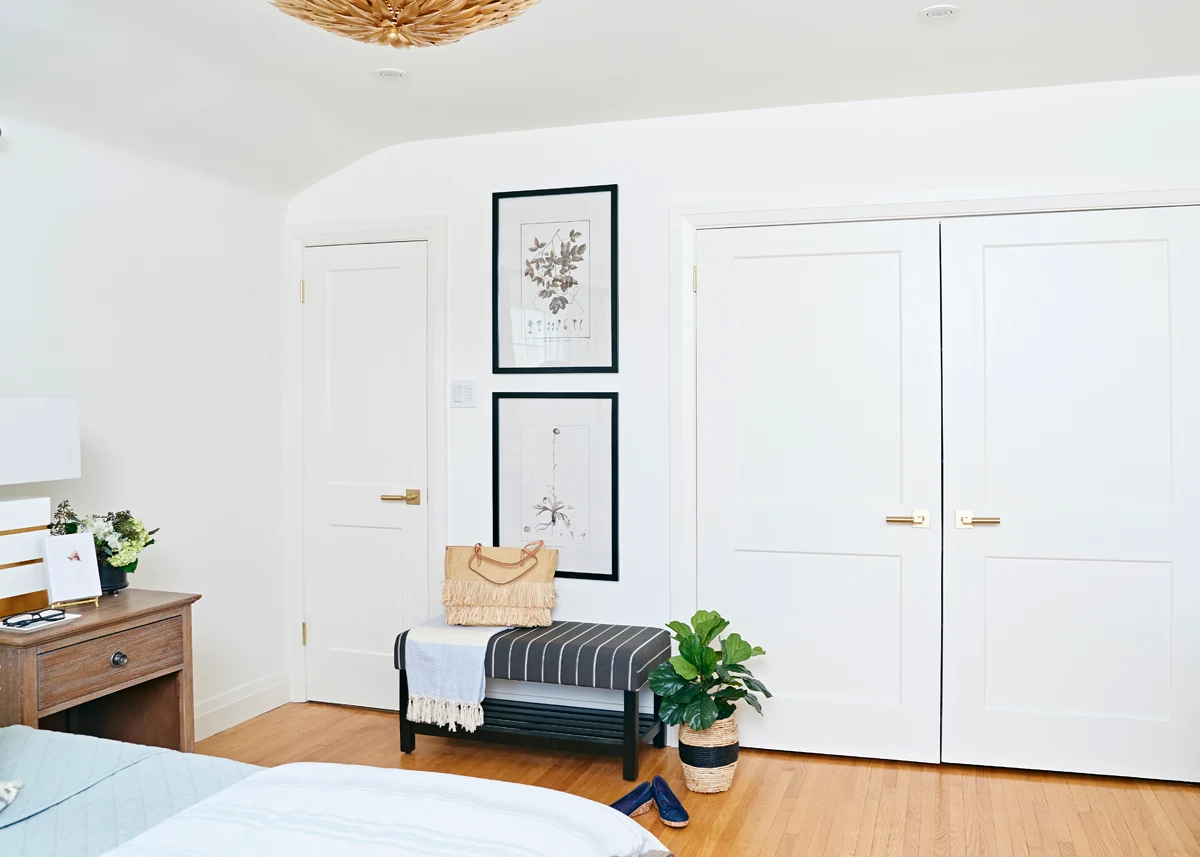 calm neutral master bedroom, Rambling Renovators, striped bench, double closet doors