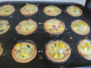 Zucchini mini-quiches in pan