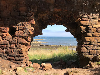 A picture showing the view out over the Forth through a doorway created in tower wall.  Photo by Kevin Nosferatu for the Skulferatu Project.