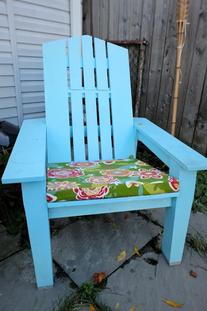 painted wood Adirondack chair with custom cushion