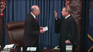 https://commons.wikimedia.org/wiki/File:Senator_Chuck_Grassley_administers_the_oath_of_office_to_Chief_Justice_John_Roberts.jpg