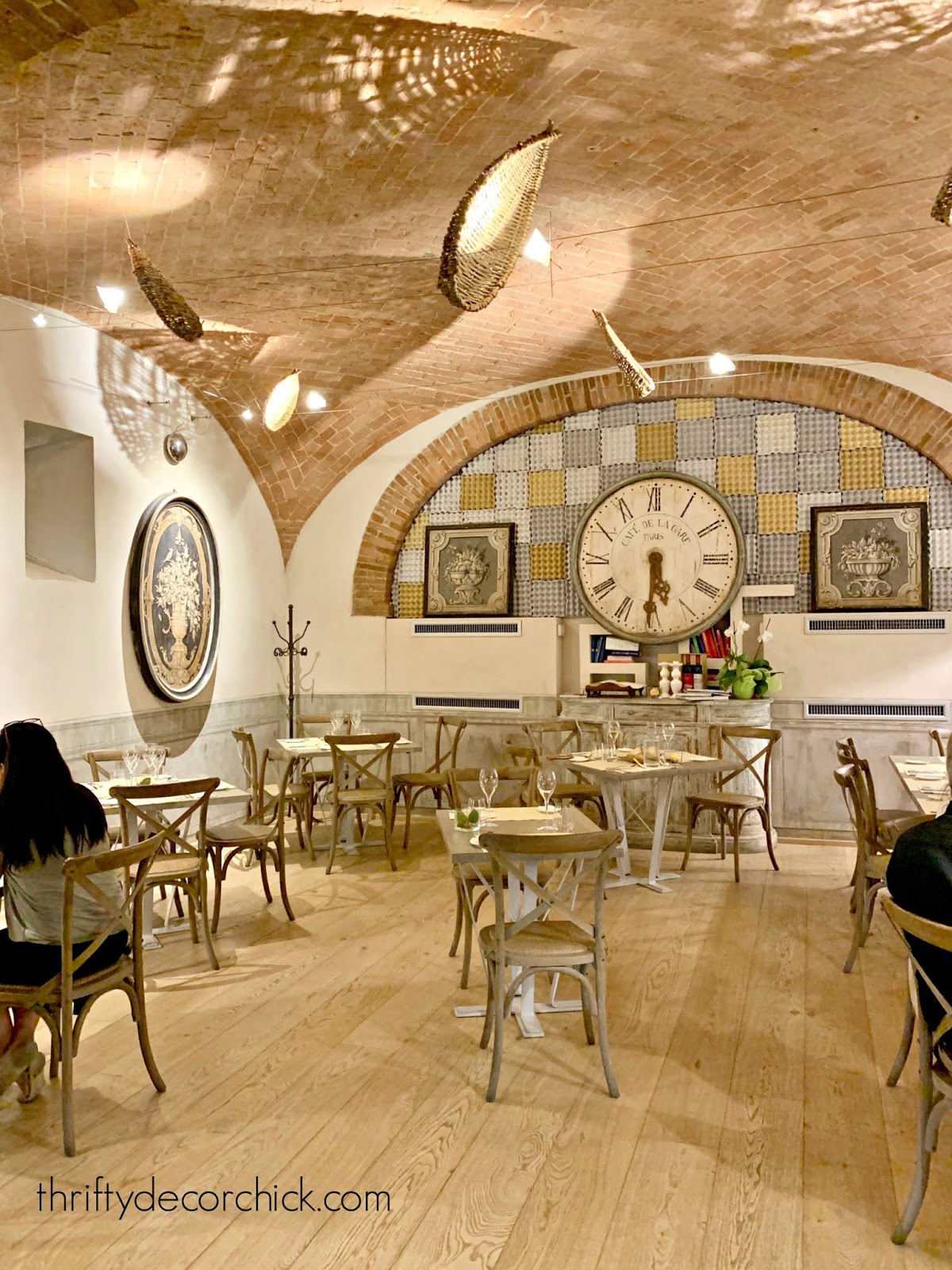 Tuscan style -- light wood, brick ceilings, soft light 