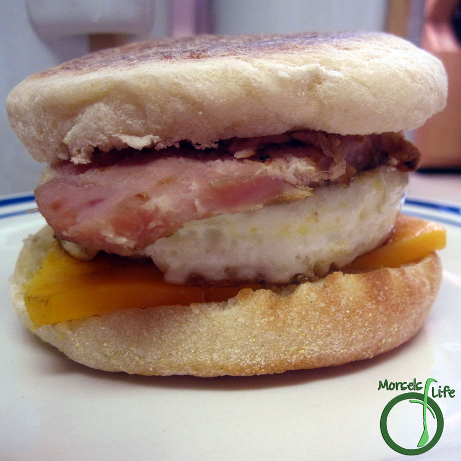 Morsels of Life - DIY Egg McMuffin - Layer some cheese, a griddle fried egg, and some ham between some toasted English muffins to make your own Egg McMuffin.