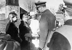 Former Soviet Lt. General Andrey Andreyevich Vlasov greets some admirers worldwartwo.filminspector.com