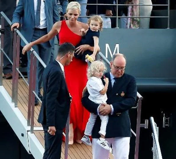 Prince Albert, Princess Charlene, Princess Gabriella and Prince Jacques. Princess Charlene wore Roland Mouret one shoulder silk dress