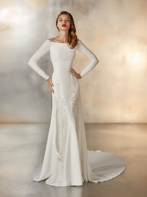 FORMATION - Long-sleeved, minimalist crepe dress with original beaded panelling at skirt, and sheer beaded lining along bateau neckline and back K'Mich Weddings - wedding planning - wedding dresses - formation - fall pronovias collection