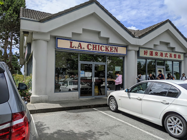 There's a long line of people outside of LA Chicken