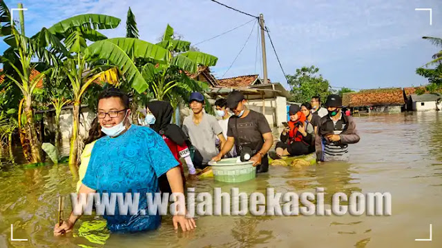 Komunitas Content Creator Bantu Warga Terdampak Banjir di Sukawangi Komunitas Content Creator Bantu Warga Terdampak Banjir di Sukawangi