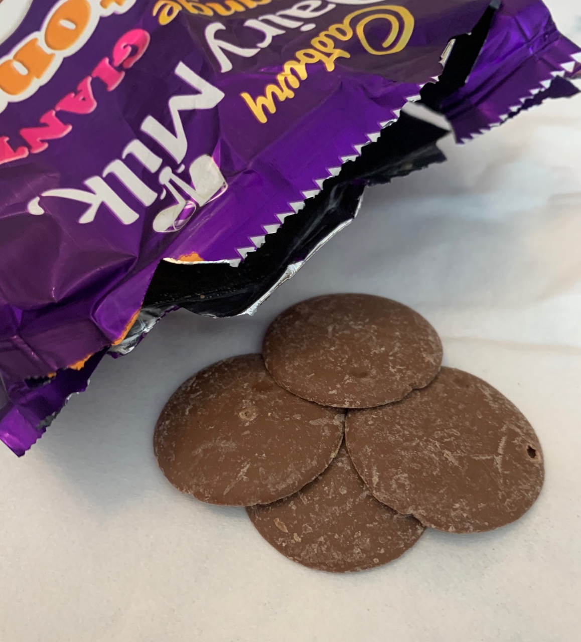 FOODSTUFF FINDS Dairy Milk Orange Giant Buttons (GB Gifts) By Cinabar