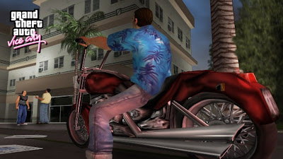 خلفيات تومي وهو يقود دراجته نارية الحمراء بجودة HD