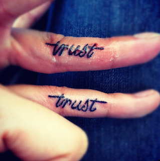 tattoo on inside of finger trust