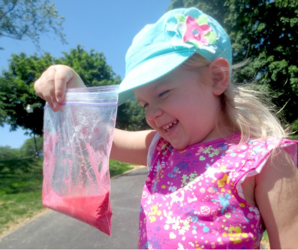 Combine science and art and make chalk explode!  This baggie experiment will leave kids of all ages in awe. #explodingchalkbags #explodingchalk #explodingchalkpaint #explodingchalkrockets #eruptingchalkpaint #sidewalkchalk #sidewalkchalkrecipe #chalkart #scienceexperimentskids #growingajeweledrose #activitiesforkids