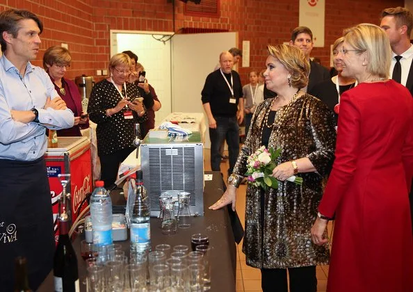 Grand Duchess Maria Teresa visited the 71st Red Cross Bazaar held at Victor Hugo Hall in Luxembourg. printed coat