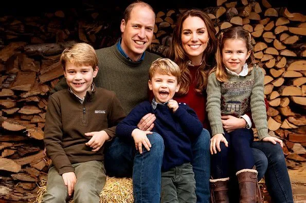 Prince George and Prince Louis. Kate Middleton wore a burgundy sweater and blouse by Sezane. Princess Charlotte wore a green knit sweater