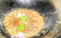 Prepared manchurian sauce in a wok for chicken manchurian recipe